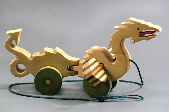 wooden articulated dragon pull toy